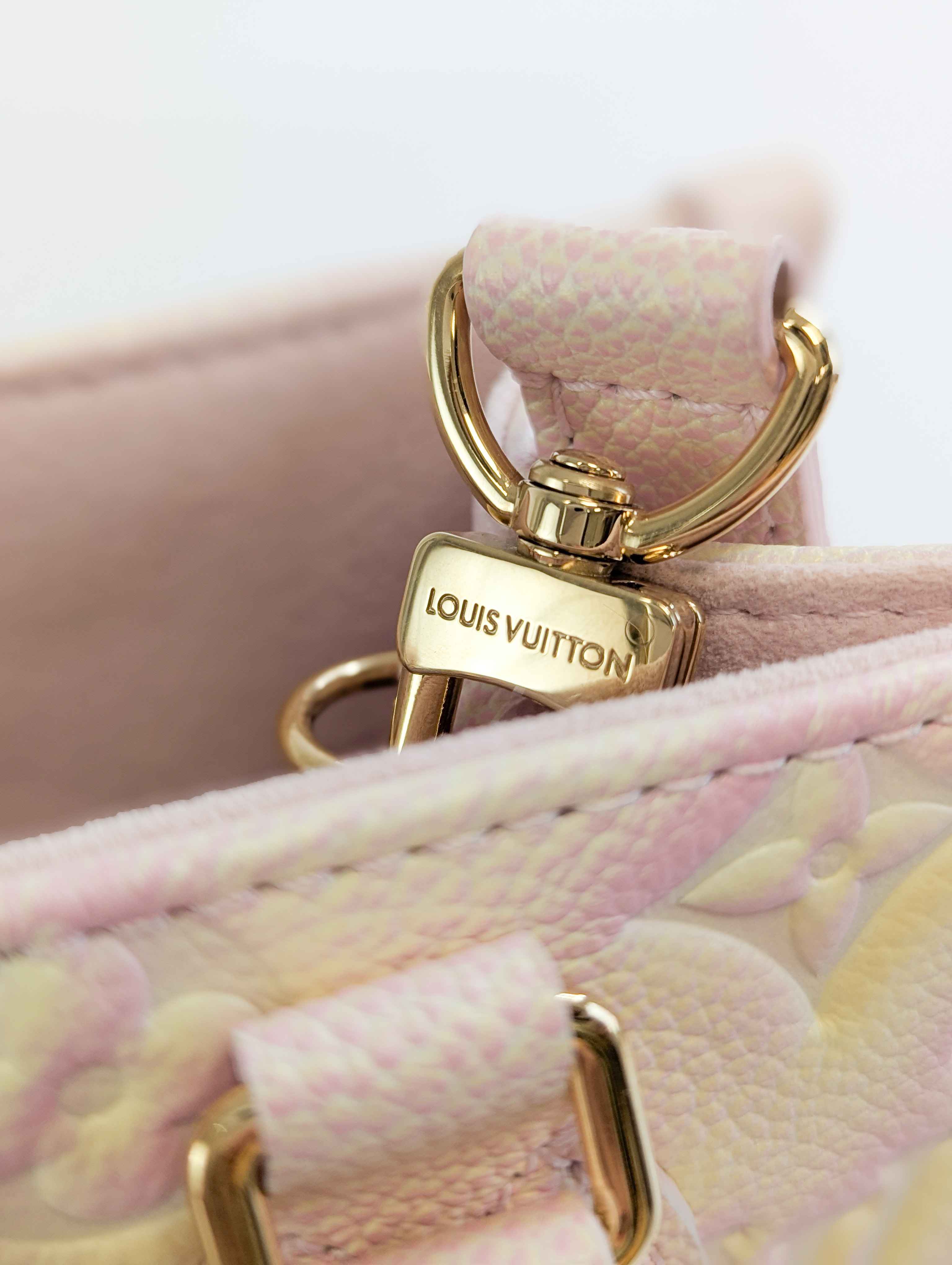 Louis Vuitton Monogram Empreinte pink und yellow Onthego PM 